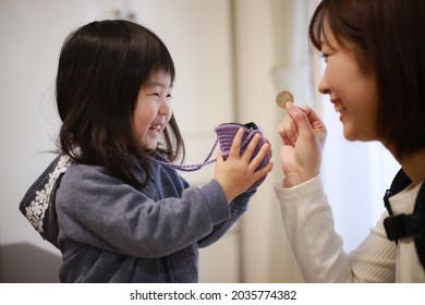 Image Of A Girl Receiving Pocket Money 