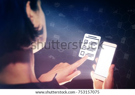 Image of a girl with a smartphone in hands. She presses on the  questionnaire icon. Concept of online testing, questionnaires, voting.