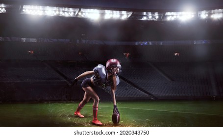 Image of a girl in the uniform of an American football team player preparing to play the ball at the stadium. Sports concept. Mixed media - Powered by Shutterstock