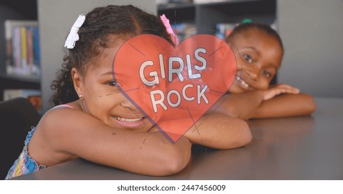 Image of girls rock text over school girls. female power, feminism and gender equality concept digitally generated image. - Powered by Shutterstock