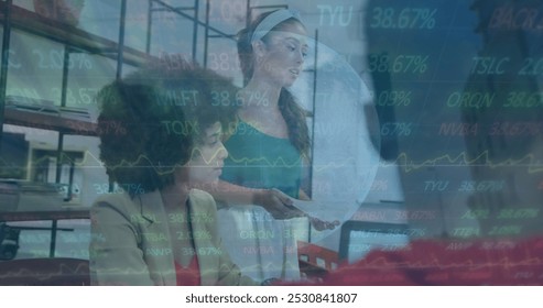 Image of globe, graphs, trading board over multiracial coworkers sharing ideas in office. Digital composite, multiple exposure, globalization, stock market, investment and technology concept. - Powered by Shutterstock