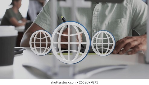 Image of globe icons, binary coding data processing over biracial businessman in office. Global finance, business, connections, computing and data processing concept digitally generated image.