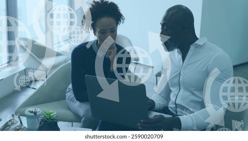 Image of globe icons and data processing over diverse business people in office. Global finance, business, connections, computing and data processing concept digitally generated image.