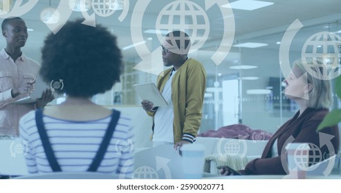 Image of globe icons and data processing over diverse business people in office. Global finance, business, connections, computing and data processing concept digitally generated image.