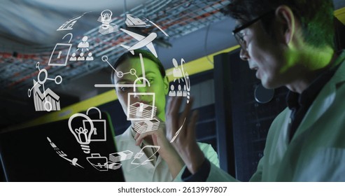 Image of globe with icons over diverse male and female it engineers checking computer server. digital interface, cloud computing concept and technology concept digitally generated image. - Powered by Shutterstock - Get 15% off with code: PIKWIZARD15