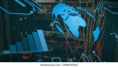 Image of globe spinning and data processing over cables in computer server. global computing and data processing concept digitally generated image.