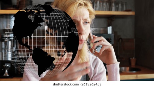 Image of globe spinning over woman using smartphone. global connections, digital interface and technology concept digitally generated image.