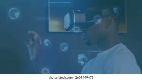 Image of globes spinning on screens over man wearing vr headset. global data processing, communication and global technology concept digitally generated image.