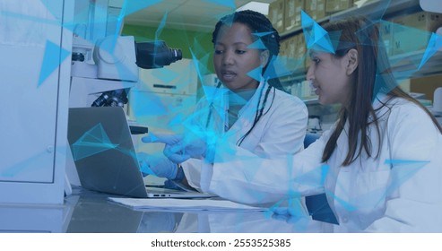 Image of glowing light trails over diverse scientists in laboratory. Global science, connections, computing and data processing concept digitally generated image. - Powered by Shutterstock