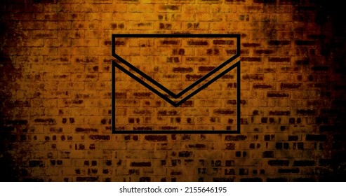 Image of glowing neon envelope icon on brick wall. social media and communication concept digitally generated image. - Powered by Shutterstock