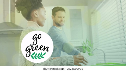 Image of go green text and light spots over diverse couple sorting plastic bottles. Lifestyle, ecology, environment and domestic life concept digitally generated image. - Powered by Shutterstock