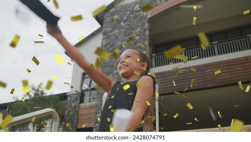 Image of gold confetti over celebrating caucasian schoolgirl throwing mortar board in air. School, achievement, education, childhood and graduation, digitally generated image. - Powered by Shutterstock