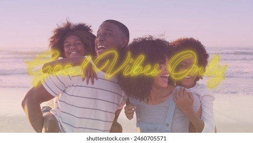 Image of good vibes only over happy african american family having fun on beach. family, togetherness and spending quality time concept digitally generated image. - Powered by Shutterstock