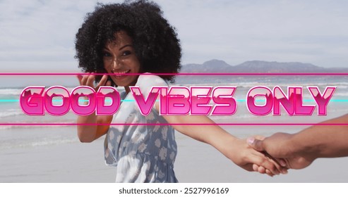 Image of good vibes only text with african american couple at beach. retro communication and social media concept digitally generated image. - Powered by Shutterstock