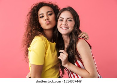 Image Of Gorgeous Multinational Girls Smiling Together At Camera Isolated Over Pink Background