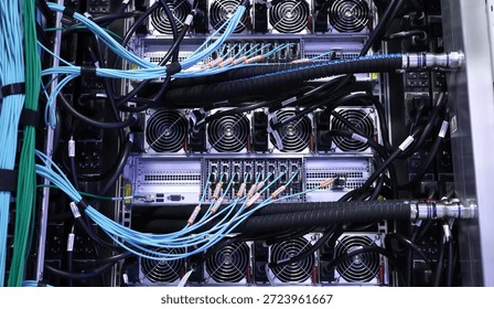 Image of a GPU Server Rack with a liquid cooling system in a high-performance data center