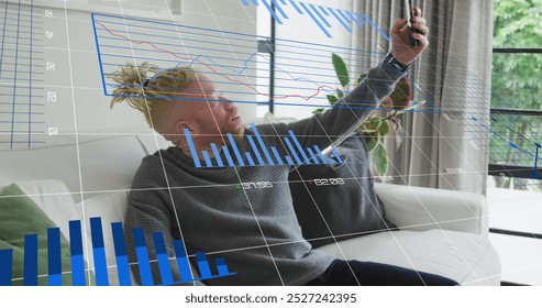 Image of graphs, changing numbers, albino african american man talking selfie using cellphone. Digital composite, multiple exposure, report, business, growth and technology concept. - Powered by Shutterstock