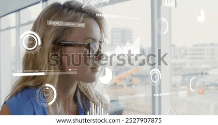 Image of graphs, changing numbers, loading circles and bars, thoughtful caucasian woman. Digital composite, multiple exposure, report, growth, progress and business concept.