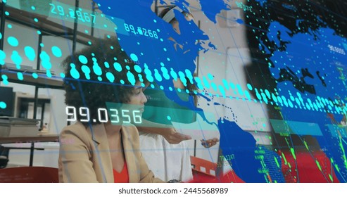 Image of graphs, changing numbers and map over diverse woman sharing ideas with coworkers. Digital composite, multiple exposure, report, business, global, discussion and teamwork concept.