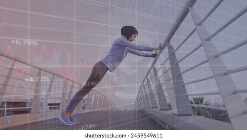 Image of graphs and circle with grid over biracial woman in hijab stretching on footbridge. Digital composite, multiple exposure, report, business, technology, data, exercise, fitness concept. - Powered by Shutterstock