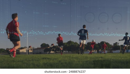 Image of graphs over diverse male soccer players during training. Sport, soccer, finacne and technology concept digitally generated image. - Powered by Shutterstock