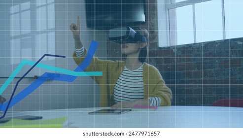 Image of graphs over grid pattern over asian woman wearing vr headset and gesturing in office. Digital composite, multiple exposure, report, business, growth and technology concept.