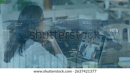 Image of graphs and world map over woman having image call on laptop. Business, finance, economy and technology concept digitally generated image.