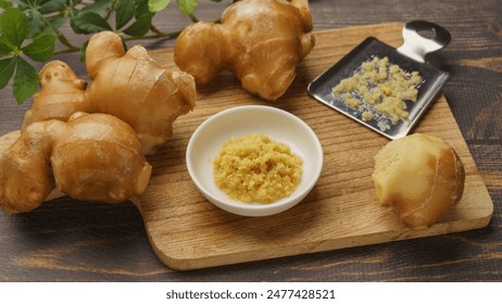 Image of grating ginger. Ginger and grater tool. - Powered by Shutterstock