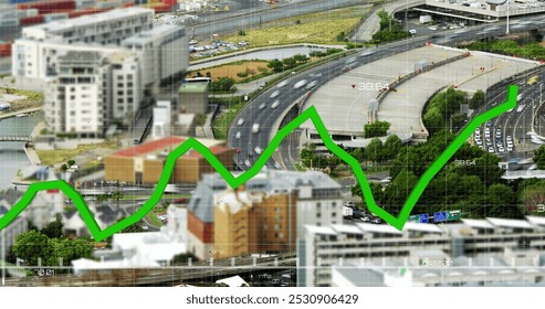 Image of green line and financial data processing over cityscape. Global business, finance, data processing and digital interface concept digitally generated image.