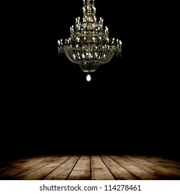 Image Of Grunge Dark Room Interior With Wood Floor And Chandelier. Background