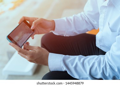 image hands of Businessmen trading stocks online. Stock brokers looking at graphs, indexes and numbers while using smartphone or modern mobile screens. investor working new start up, Business concept