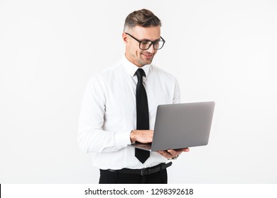 Image Of A Handsome Cheerful Business Man Isolated Over White Wall Background Using Laptop Computer.