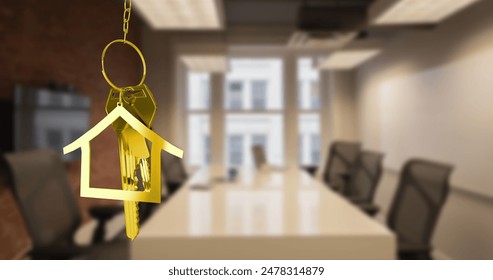 Image of hanging golden house keys against interior of a office conference room. Interior designing and real estate concept - Powered by Shutterstock