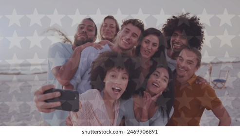 Image of happy independence day text and light spots over diverse friends at beach. 4th of july and celebration concept digitally generated image. - Powered by Shutterstock