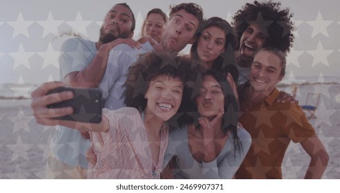 Image of happy independence day text and light spots over diverse friends at beach. 4th of july and celebration concept digitally generated image. - Powered by Shutterstock