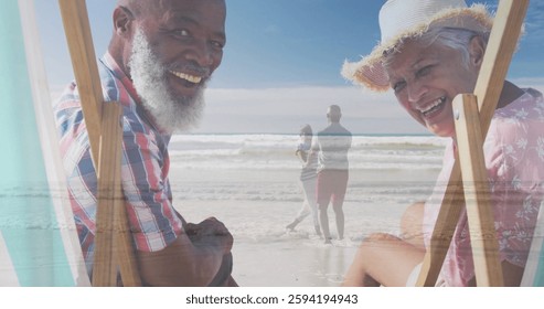 Image of happy senior biracial couple over senior couple dancing at beach. Retirement, vacation and digital interface concept digitally generated image. - Powered by Shutterstock - Get 15% off with code: PIKWIZARD15