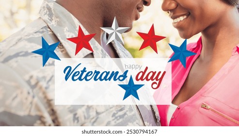 Image of happy veterans day text over male soldier embracing wife. soldier returning home to family concept digitally generated image. - Powered by Shutterstock