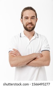 Image of a happy young handsome bearded man posing isolated over white wall background. - Shutterstock ID 1566495277