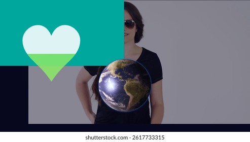 Image of heart and globe over caucasian woman. global business, data processing and digital interface concept digitally generated image.