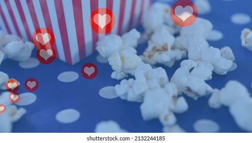 Image of heart icons over box of popcorn. popcorn day and celebration concept digitally generated image. - Powered by Shutterstock