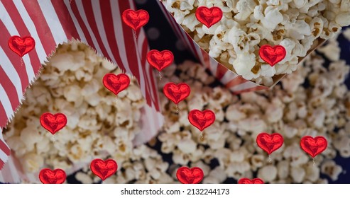 Image of heart icons over boxes of popcorn. popcorn day and celebration concept digitally generated image. - Powered by Shutterstock