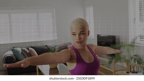 Image of heart monitor over biracial woman exercising at home. Exercise, fitness, lifestyle and happiness concept digitally generated image. - Powered by Shutterstock