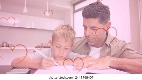 Image of hearts falling over caucasian man and his son doing homework. fashion and lifestyle concept digitally generated image. - Powered by Shutterstock