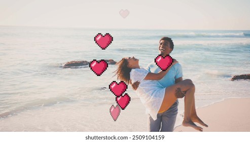 Image of hearts moving over biracial man carrying woman on beach in summer. Love, romance, valentine's day and vacation concept digitally generated image. - Powered by Shutterstock