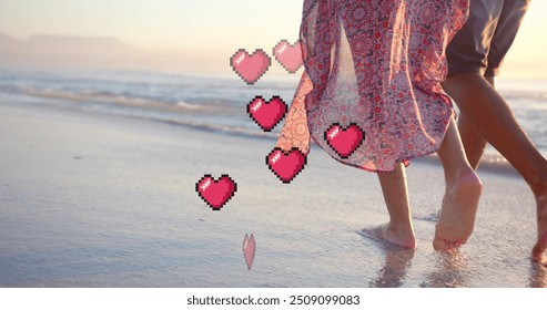 Image of hearts moving over legs of diverse couple in love on beach in summer. Love, romance, valentine's day and vacation concept digitally generated image. - Powered by Shutterstock