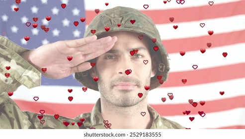 Image of hearts over caucasian male soldier and flag of usa. Politics and patriotism concept digitally generated image. - Powered by Shutterstock