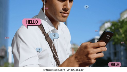 Image of hello and hi over midsection of biracial man using smartphone in city. global connections, social media, technology and digital interface concept digitally generated image. - Powered by Shutterstock