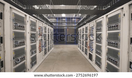 Image of a high-density data center featuring server racks designed for high-performance computing for big data processing and AI research.