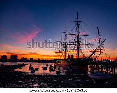 Image of HMS Warrior as sunset.