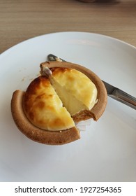 An Image Of Hokkaido Cheese Tart On The White Dish